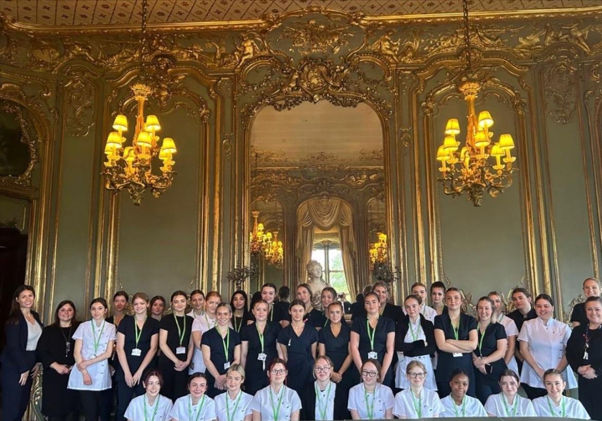 Beauty students in a decorative hall