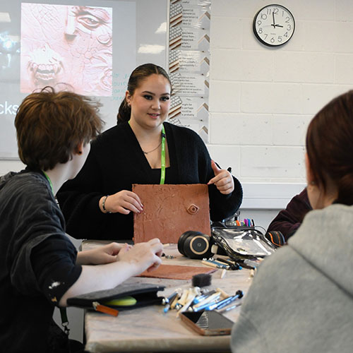 Guest Lecturer With Clay Board