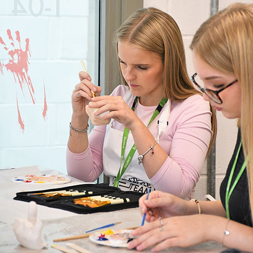 Student Painting Hand Cast