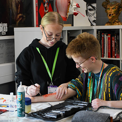 Two Students Burn Effects Painting